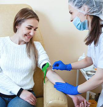 8 egg donation disqualifiers - woman getting blood drawn