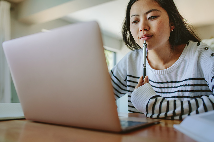 young woman searching on computer